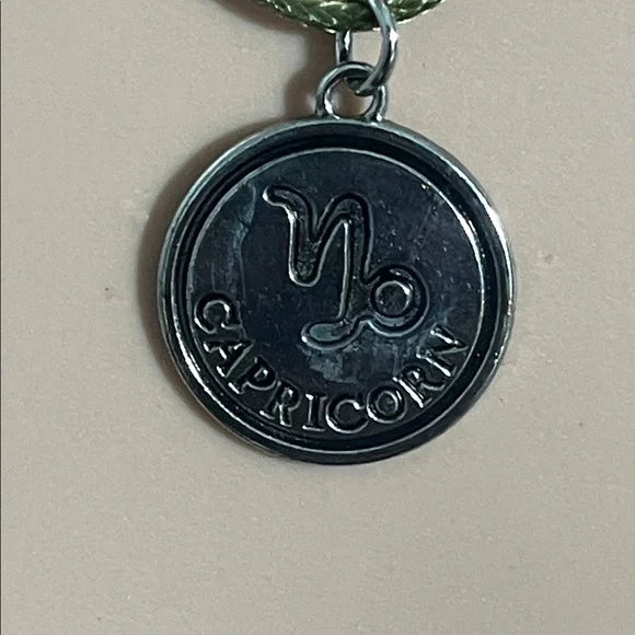 Pick (1) Zodiac Hand Crafted Corded Necklace with Silver Pendant - Picture 4 of 17